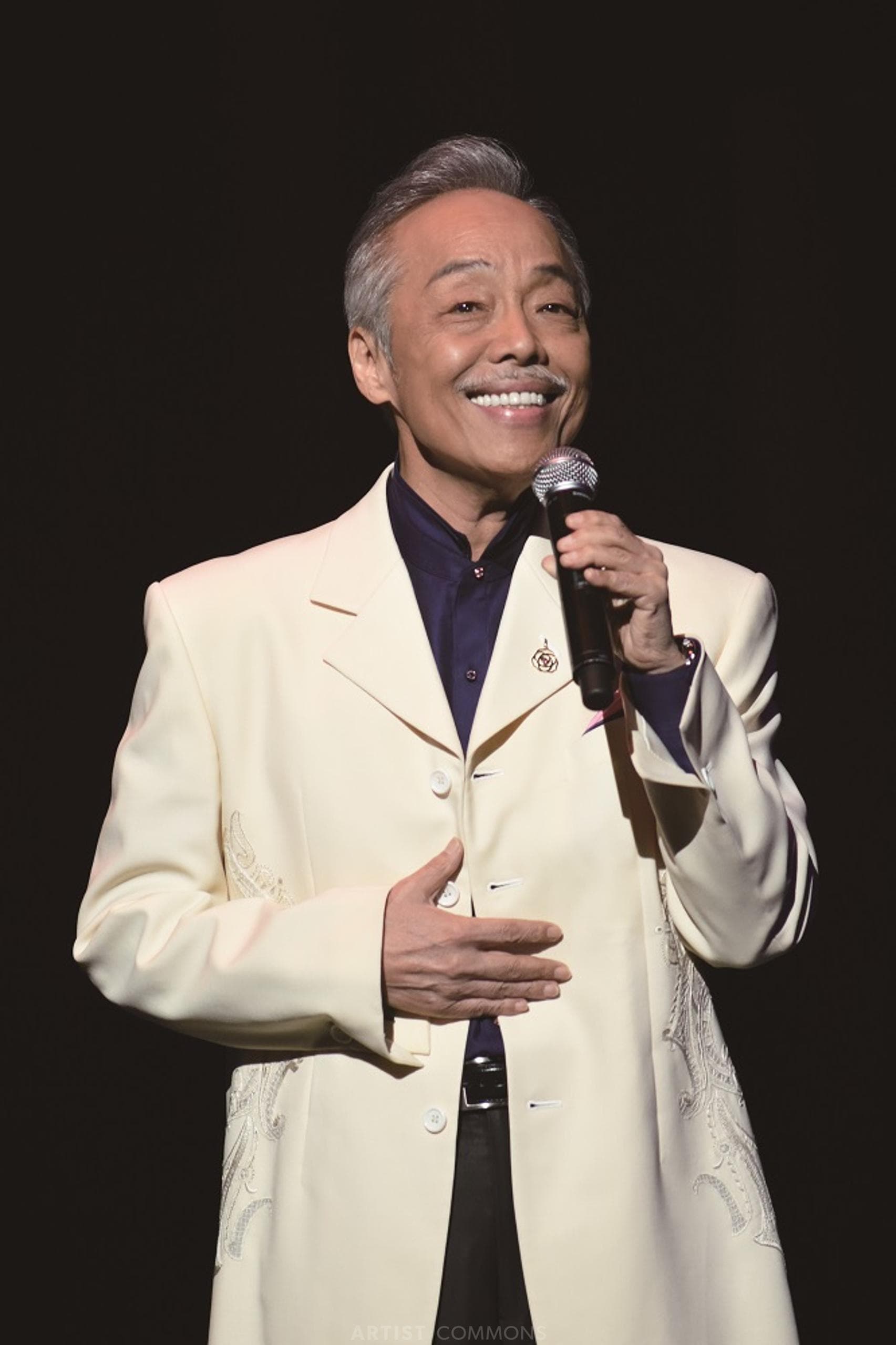 谷村新司